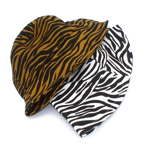 Stylish zebra print cotton bucket hats in brown and white color options for sun protection