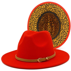 Red wool fedora hat with brown leather belt and leopard print lining interior