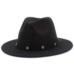 Close-up of black wool fedora with sparkling rhinestone floral ornaments on a ribbon
