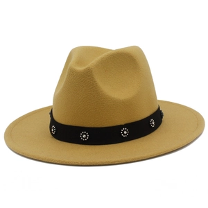 Close-up of camel wool fedora hat with black band featuring silver floral rhinestones