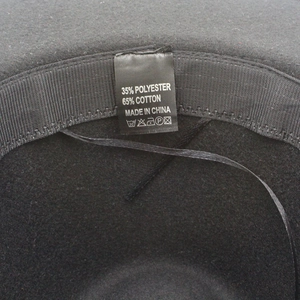 Detail view of cotton-polyester fedora hat interior with adjustable strap and size label
