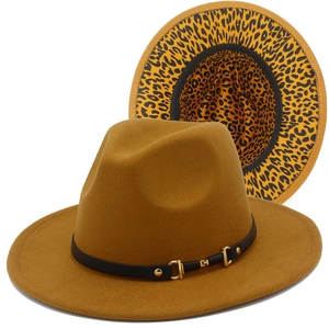 Close-up of wool fedora hat featuring golden buckle detail and leopard print brim lining