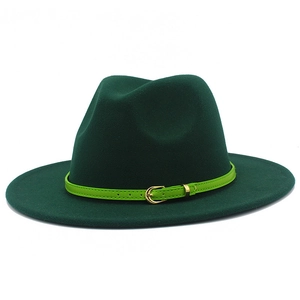 Detailed close-up of dark green wool felt fedora with bright green belt and gold buckle