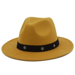 Detail of wool-like fedora hat in mustard yellow with floral rhinestone ribbon band