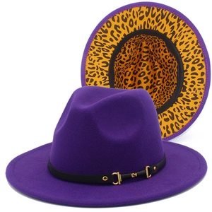 Detail view of purple fedora hat with leopard print brim and gold buckle accents
