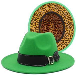 Detail of green fedora hat showing leopard print lining and black belt buckle