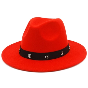 Detail of red wool fedora hat with rhinestone floral band decoration on white background