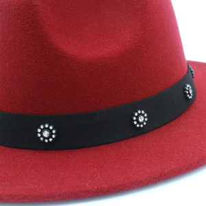 Elegant red wool fedora hat with black ribbon and floral diamond accents for women
