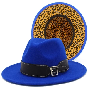 Detail of blue fedora hat with leopard print lining and black faux leather belt band