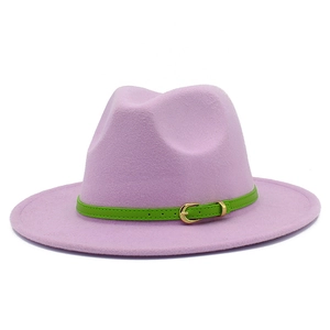 Lilac wool fedora hat with bright green leather belt and gold buckle on white background