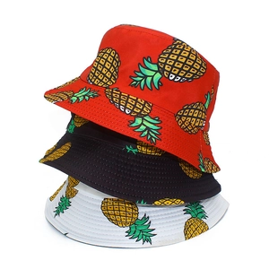 Breathable cotton bucket hats in red black and white with yellow pineapple prints