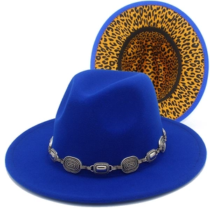 Detail of royal blue wool fedora hat with silver chain and leopard print lining