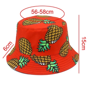Detailed size chart of red bucket hat with yellow pineapple print showing dimensions