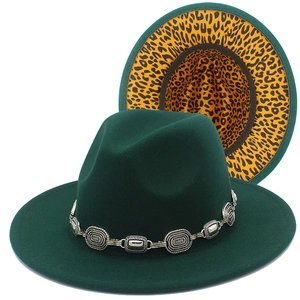 Detail view of dark green wool fedora hats with metal chain and leopard print lining