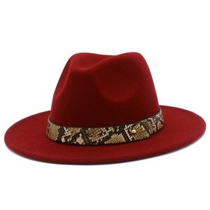 Detailed view of the dark red wool fedora featuring a faux snakeskin band and gold stud
