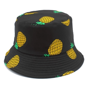 Unisex black cotton bucket hat featuring all-over yellow and green pineapple prints