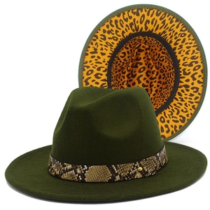Detail of dark green wool fedora showing snakeskin band and leopard print lining