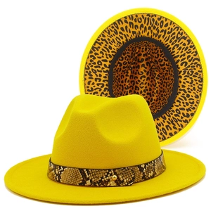 Yellow fedora hat with snakeskin band and leopard print lining in a classic wide brim style