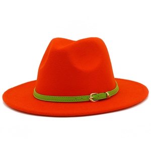 Detailed close-up of orange wool fedora hat with green belt buckle and gold pin buckle
