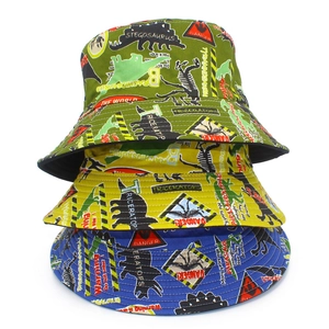Three stacked cotton sun hats with colorful dinosaur prints for outdoor beach fashion