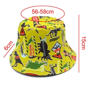 Detail view of cotton sun hat with dinosaur prints showing 56-58cm head size dimensions