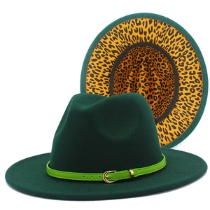 Detail of dark green Fedora hat with bright green band and leopard print brim underside
