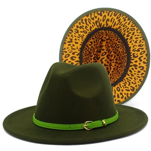 Detail of dark green wool fedora hat featuring a leopard print brim lining and green band