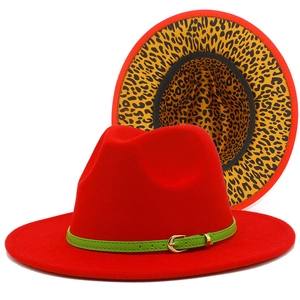 Red wool fedora hat with green belt buckle and leopard print underbrim jazz hat