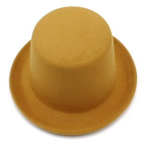 Top-down view of a mustard yellow wool fedora showing detailed stitching on the brim