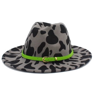 Gray fedora hat with black cow print and neon green leather band with golden buckle