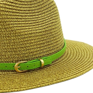 Golden woven straw sun hat with vibrant green faux leather strap and metal buckle accessory