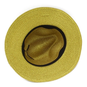 Detail view of woven straw hat interior with sweatband and adjustable drawstring