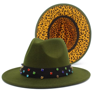 Detail of olive green fedora with multi-color rhinestones and leopard print brim lining