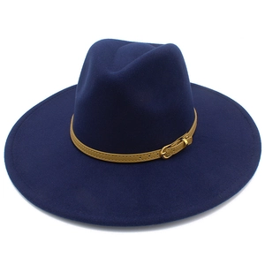 Detail of navy blue wool fedora hat with wide brim and brown leather band featuring gold buckle