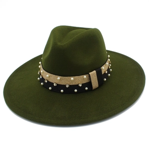Detail of dark green wool fedora featuring black ribbon with pearls and rhinestones