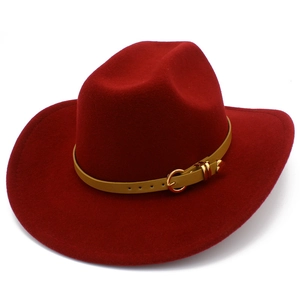 Detail of the dark red felt hat crown with faux leather belt and gold buckle decoration