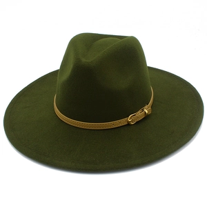 Close-up of olive green wool fedora hat featuring a khaki leather band and gold buckle detail
