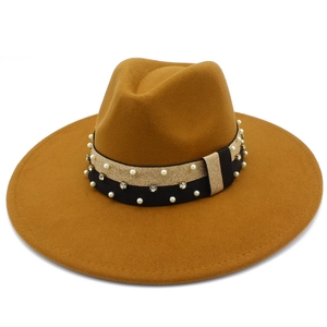 Detailed view of camel wool fedora with a pearl and rhinestone embellished hatband