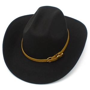 Detail of black fedora hat with gold buckle on tan leather strap and wide brim