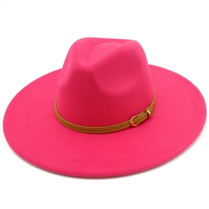 Rose red wool fedora hat with a wide brim and decorative brown leather belt strap