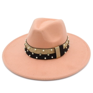 Detail of light pink wool felt hat with pearl and rhinestone embellished decorative band