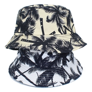 Double-sided reversible canvas bucket hat with palm tree print for summer sun protection