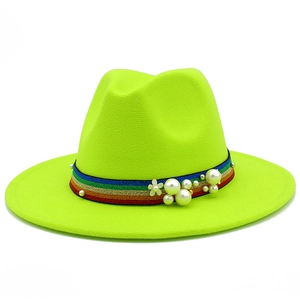 Detail of neon green wool fedora with rainbow ribbon band and pearl flower accents