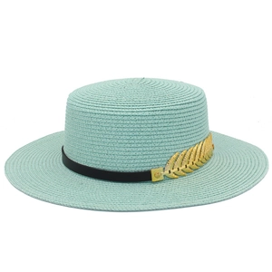 Chic flat top mint green straw sun hat with black ribbon and gold leaf accent