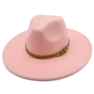 Detailed view of pink wide brim wool fedora with brown leather band and gold buckle