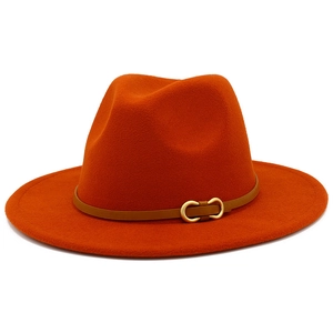 Detail of orange wool fedora with brown leather band and gold double ring buckle detail