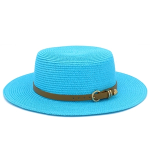 Detail of bright blue boater hat with a brown leather strap and golden heart buckle