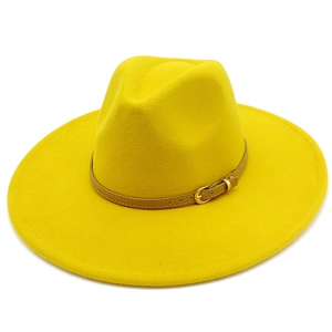 Bright yellow wool wide brim fedora hat with a brown leather belt and golden buckle