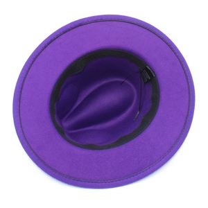 Detailed interior of a purple wide brim fedora showing sweatband and size adjustment cord
