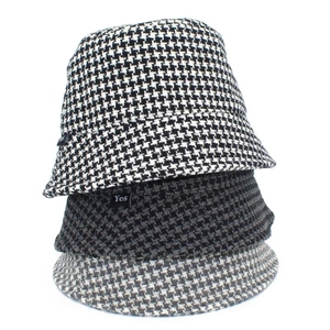Classic houndstooth bucket hat in three colors made of warm tweed fabric for women